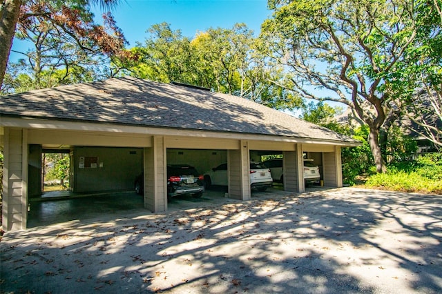 exterior space featuring a carport