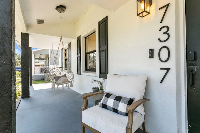 view of patio / terrace with a porch