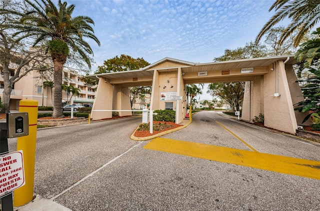 view of street with a gated entry