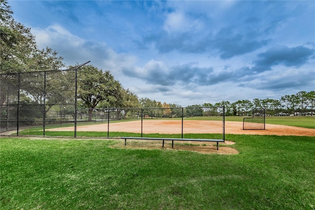 view of property's community featuring a lawn