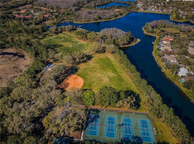 birds eye view of property with a water view