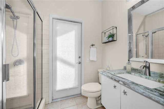 9101 Highland Ridge Way, Tampa, FL 33647 - full bathroom with vanity, a stall shower, tile patterned floors, toilet, and a baseboard radiator