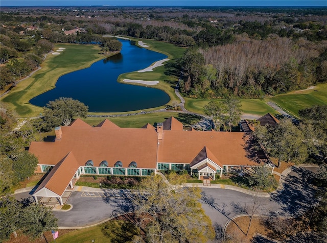 9101 Highland Ridge Way, Tampa, FL 33647 - drone / aerial view featuring a water view, golf course view, and a wooded view