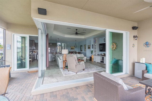 view of patio with ceiling fan