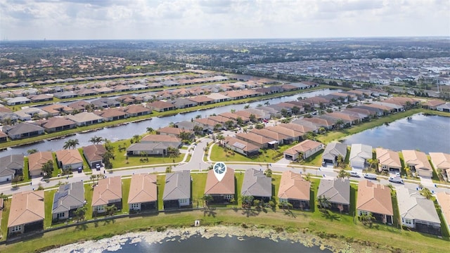 aerial view featuring a water view