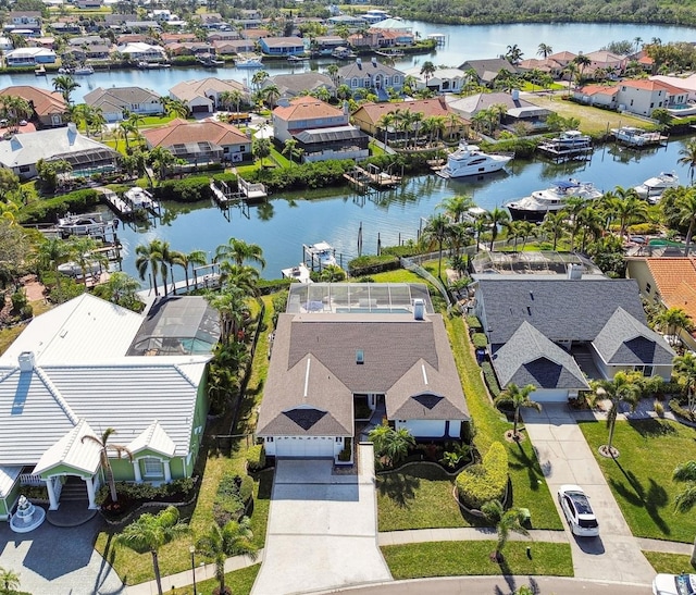 birds eye view of property featuring a water view