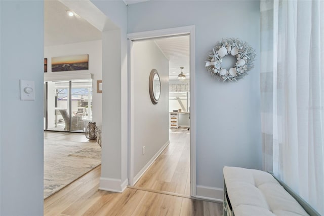 corridor featuring light hardwood / wood-style floors