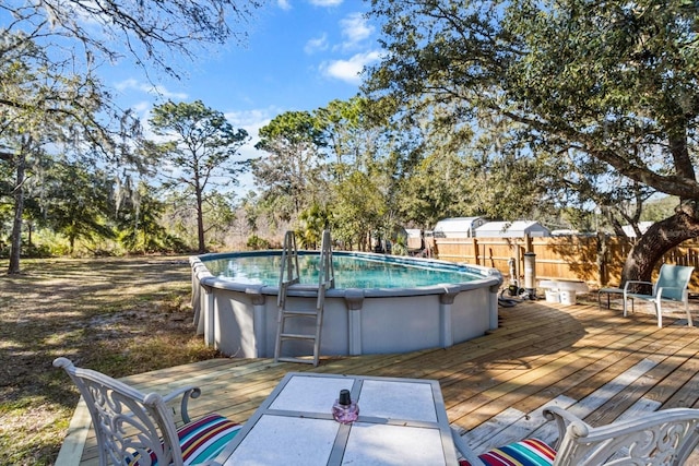 view of pool featuring a deck