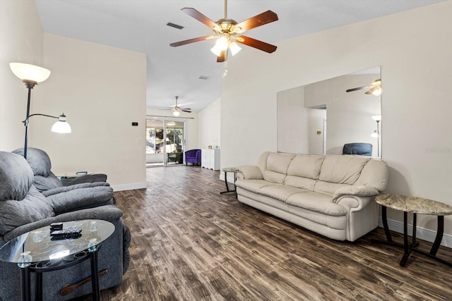 living room featuring vaulted ceiling and dark hardwood / wood-style floors