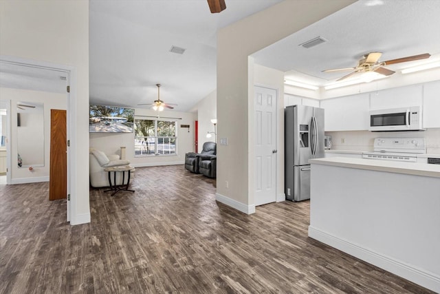 kitchen with dark hardwood / wood-style floors, lofted ceiling, white cabinets, ceiling fan, and white appliances