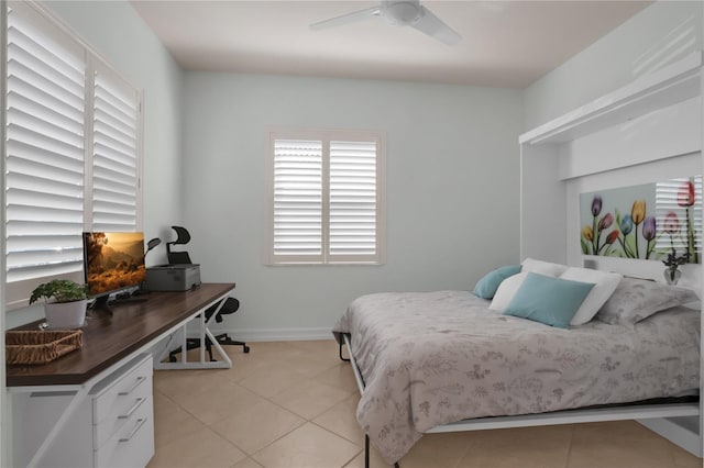 tiled bedroom with ceiling fan