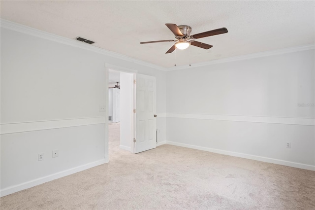 unfurnished room featuring light carpet, ornamental molding, and ceiling fan