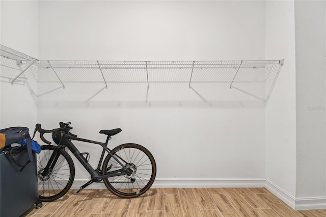 spacious closet featuring light wood finished floors