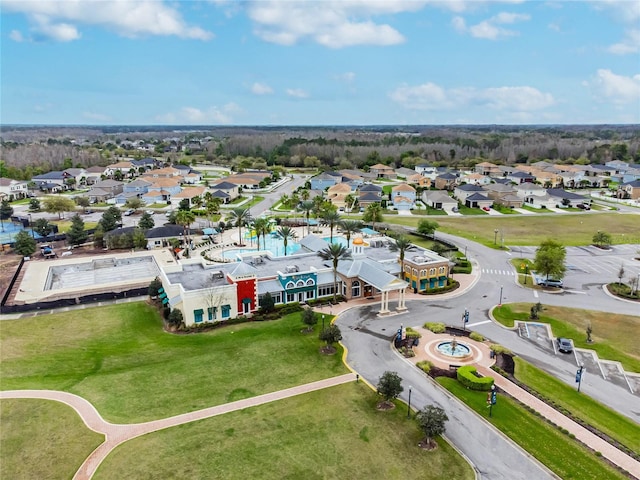 birds eye view of property with a residential view