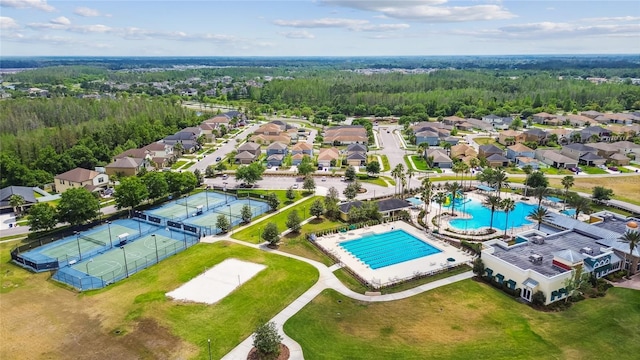 aerial view with a forest view and a residential view