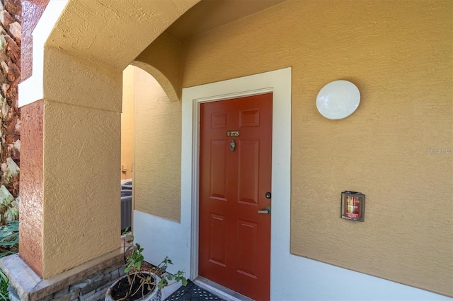 entrance to property featuring central AC