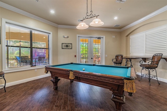 rec room with dark hardwood / wood-style floors, ornamental molding, and french doors