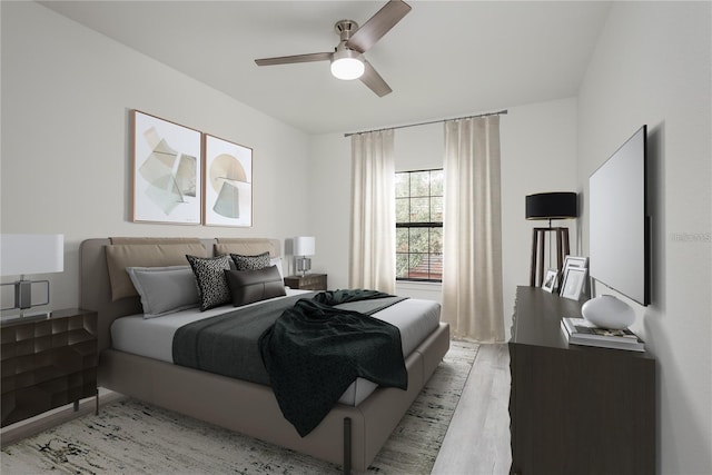 bedroom featuring ceiling fan and light hardwood / wood-style floors