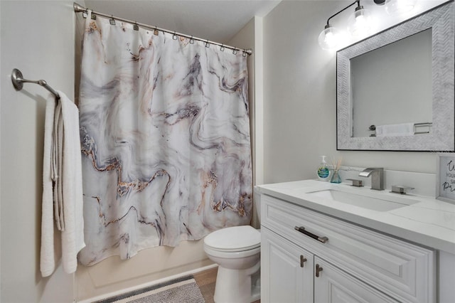 full bathroom featuring vanity, toilet, and shower / bath combo with shower curtain