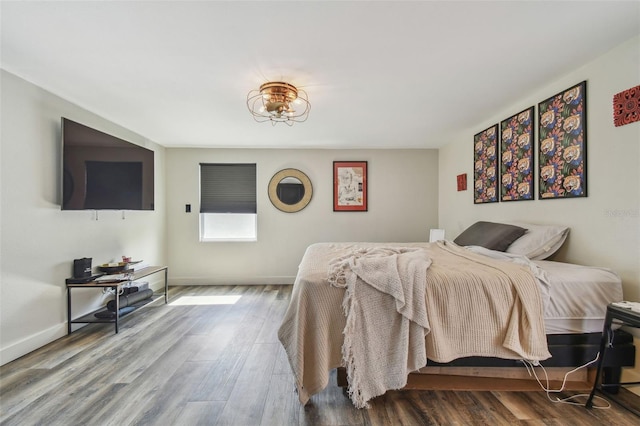 bedroom featuring wood-type flooring