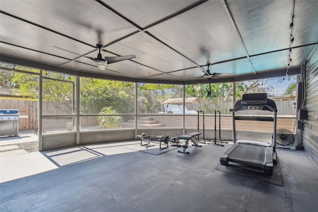 exterior space with a wealth of natural light and ceiling fan