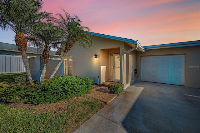 view of front of home featuring a garage