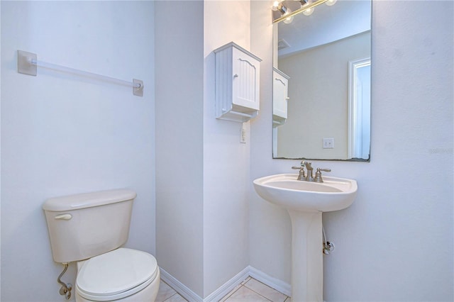 18126 Kara Ct, Tampa, FL 33647 - bathroom with toilet, tile patterned floors, and a sink