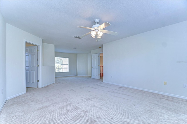 18126 Kara Ct, Tampa, FL 33647 - carpeted spare room featuring a ceiling fan and baseboards