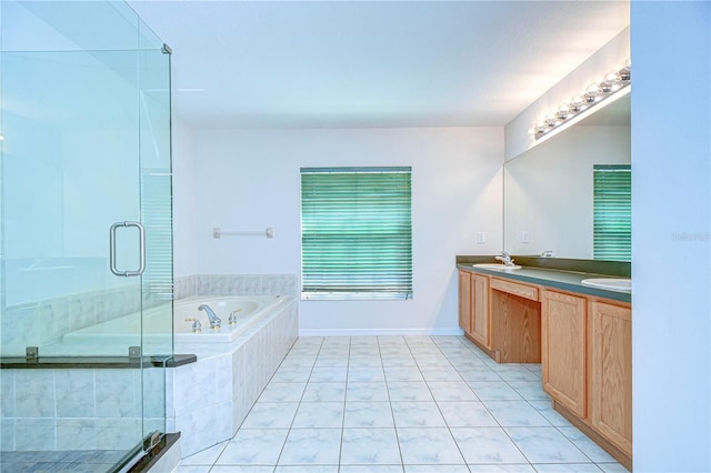 18126 Kara Ct, Tampa, FL 33647 - full bath featuring a garden tub, double vanity, a shower stall, and tile patterned floors