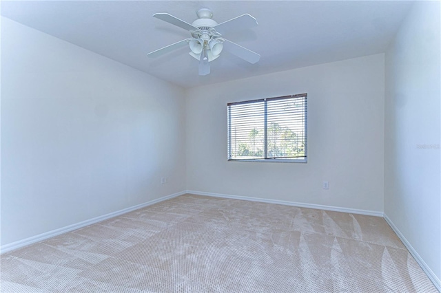 18126 Kara Ct, Tampa, FL 33647 - unfurnished room featuring light carpet, baseboards, and a ceiling fan
