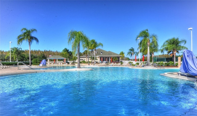 18126 Kara Ct, Tampa, FL 33647 - community pool featuring a patio area