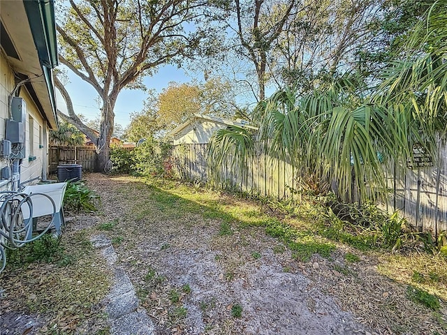 view of yard featuring central AC unit