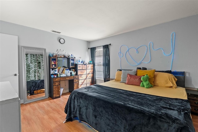 bedroom featuring light hardwood / wood-style flooring