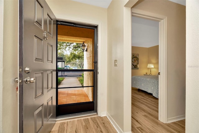 doorway featuring light wood-type flooring