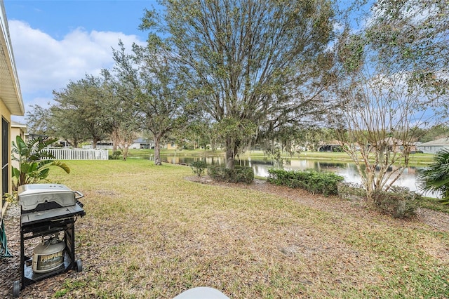 view of yard with a water view