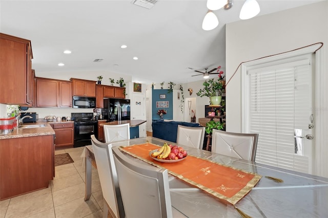 dining room with ceiling fan, light tile patterned flooring, recessed lighting, visible vents, and vaulted ceiling