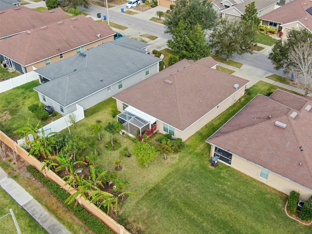 birds eye view of property with a residential view