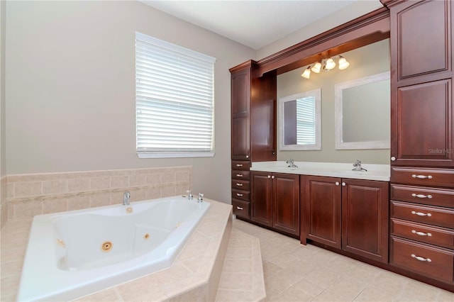 bathroom with vanity and tiled bath