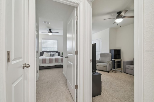 hall featuring carpet floors