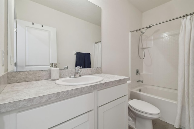 full bath featuring vanity, toilet, and shower / bath combo