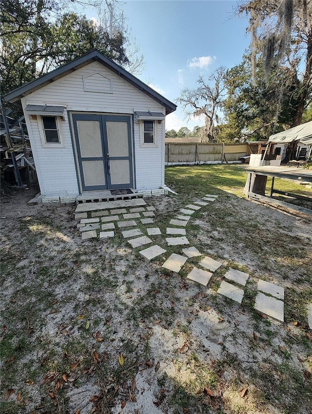 view of outdoor structure featuring a yard