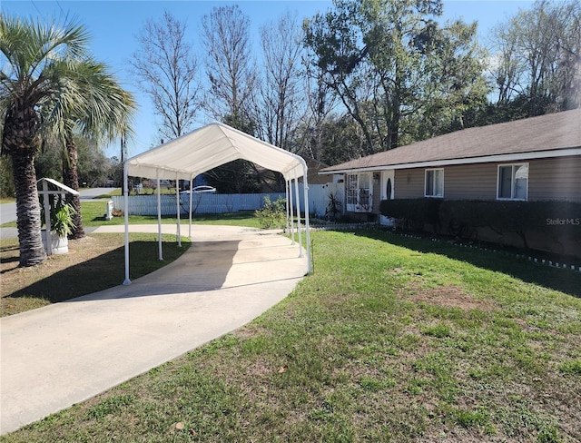 view of yard with a carport