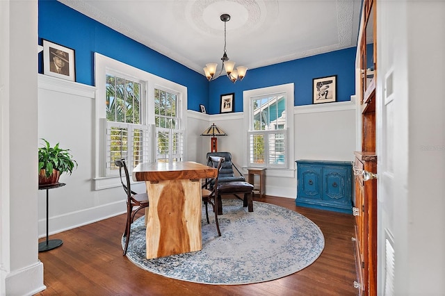 interior space featuring dark hardwood / wood-style floors and a notable chandelier