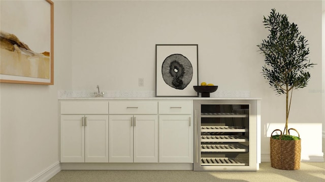 bar featuring white cabinets, sink, and wine cooler