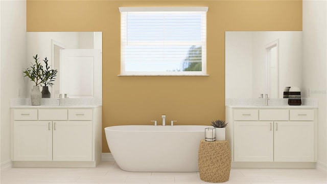 bathroom with vanity and a bath