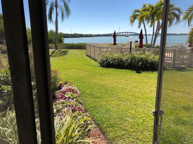 view of yard with a water view