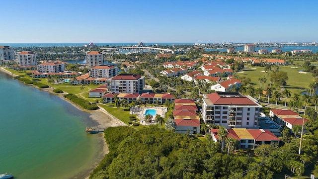 drone / aerial view with a view of city and a water view