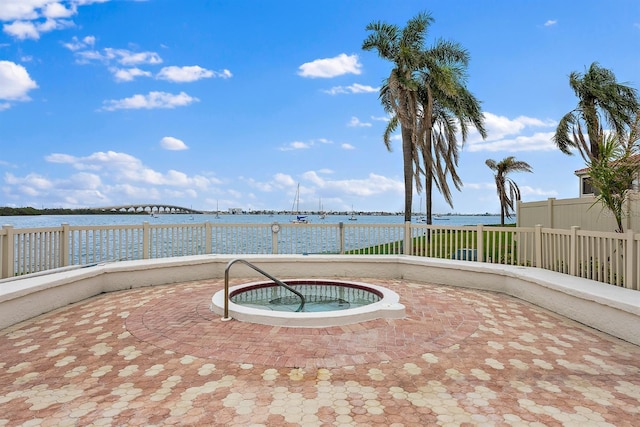 view of patio featuring a water view