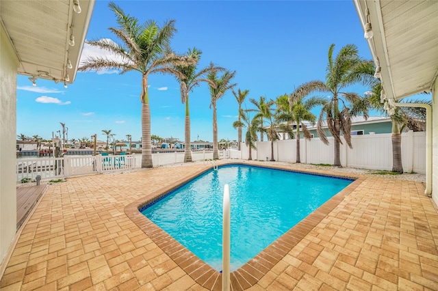 view of pool featuring a patio area