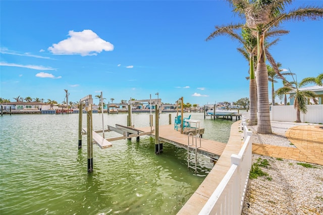 view of dock featuring a water view and boat lift